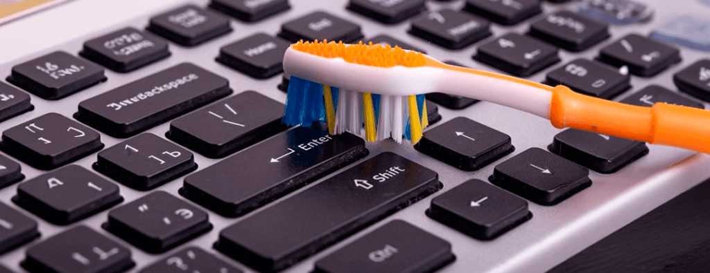 Efficiently clean and rejuvenate your keyboard with our specialized cleaner and a toothbrush for detailed care